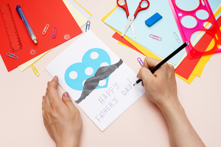 Making greeting card heart with mustache for Father's Day. art project. DIY concept. 